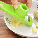 Prensa de ajo manual y moledor de jengibre para uso en la cocina